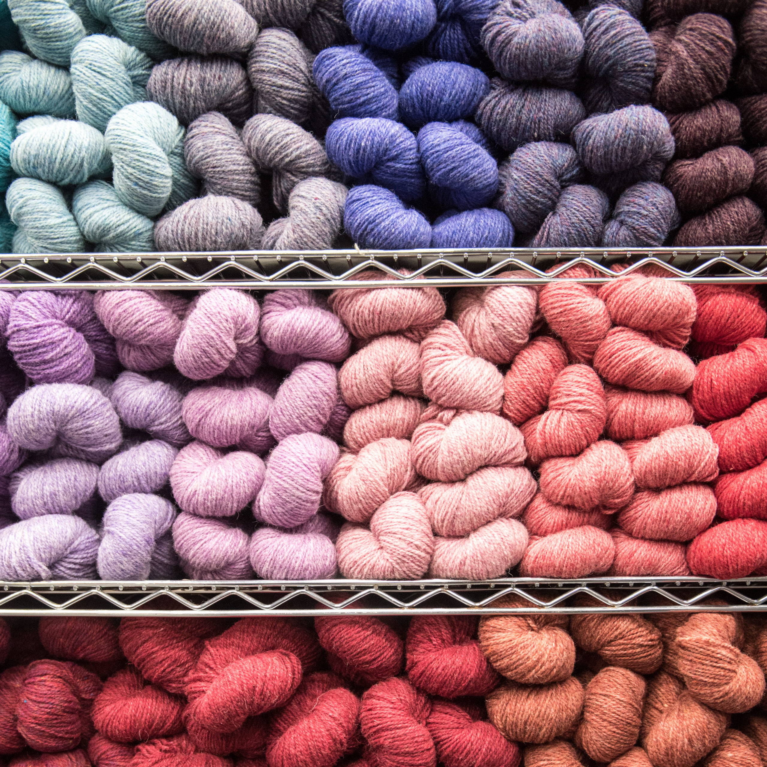 twisted hanks of yarn in a variety of colors